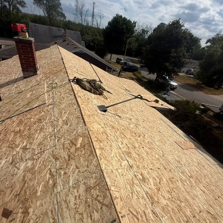 Roof fully redecked with new OSB sheathing before underlayment